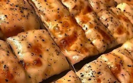 Breadsticks with cheese and garlic made at home.