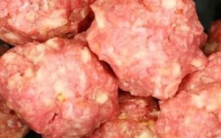 Put meatballs in a slow cooker, but the next 2 ingredients will make it special