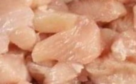 Put diced chicken and brown sugar into a slow cooker for this take-out favorite