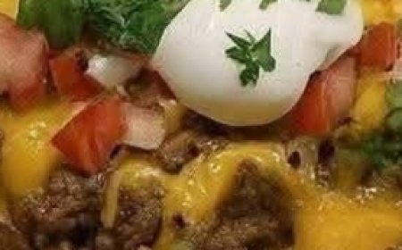 Ultimate Steak-Stuffed Baked Potatoes with Creamy Parmesan Sauce