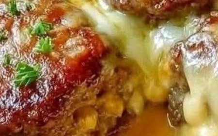 Cheesy Baked Meat Patties in Creamy Sauce