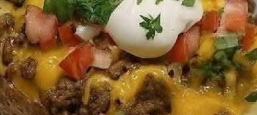 Ultimate Steak-Stuffed Baked Potatoes with Creamy Parmesan Sauce