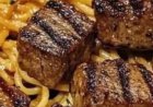 Sizzling Garlic Butter Steak Bites with Creamy Spaghetti .